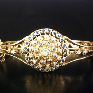 14 k Diamond and sapphire starburst bangle bracelet